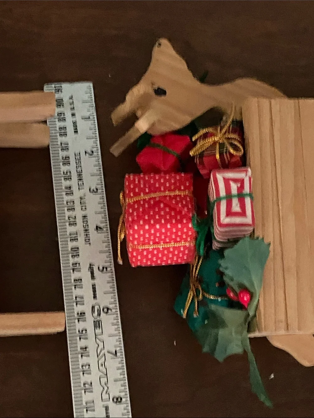 Pair of Vintage Wooden Reindeer box planters filled with Christmas gifts & holly